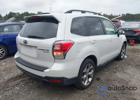 2017 Subaru Forester 2.5I Touring z USA, uszkodzony, nr VIN JF2SJAWC2HH440913